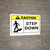 Caution: Step Down ANSI - Wall Sign