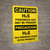 Caution: H2S Poisonous Gas May Be Present Bilingual Spanish - Wall Sign