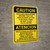 Caution: OSHA NEC Require Panel Be Kept Clear Bilingual Spanish - Wall Sign