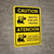Caution: Watch for Lift Trucks Bilingual Spanish - Wall Sign