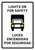 Lights On For Safety Billingual Spanish Portrait - Wall Sign