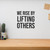 We Rise By Lifting Others - Wall Decor