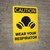 Caution: Wear Your Respirator Portrait with Graphic - Wall Sign