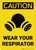 Caution: Wear Your Respirator Portrait with Graphic - Wall Sign