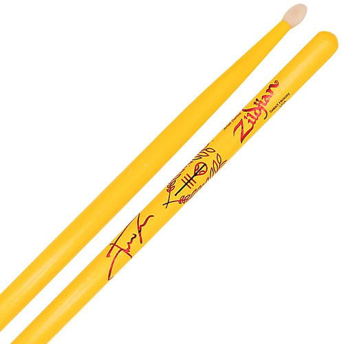 Two yellow drumsticks with red designs and text. One drumstick is positioned vertically with the tip pointing upwards, while the other is placed next to it with the tip pointing downwards. The designs include a stylized signature and some symbols.