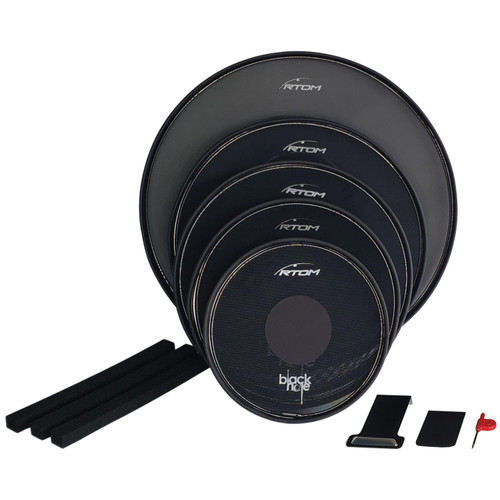 Set of RTOM drum practice pads in descending sizes, with black foam, bass drum pedal attachment, and a red tuning tool, arranged on a flat surface. Set of RTOM drum practice pads in descending sizes, with black foam, bass drum pedal attachment, and a red tuning tool, arranged on a flat surface.
