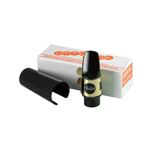 Otto Link saxophone mouthpiece with ligature and cap displayed beside its branded orange-labeled box, placed on a flat surface for product presentation.