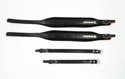 Hohner ACC4 leather accordion strap set, featuring two long padded shoulder straps and two shorter connecting straps, all in black leather with metal buckles.