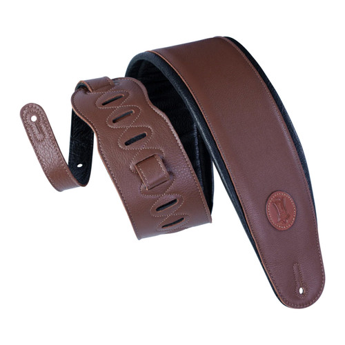 Levy's Signature Legacy Series leather bass guitar strap in brown, featuring black underside padding, adjustable slots with buckle, and a circular embossed logo on one end.