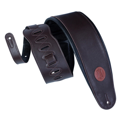 Levy's Signature Legacy Series leather bass guitar strap in dark brown, featuring black underside padding, adjustable slots with buckle, and a circular embossed logo on one end.
