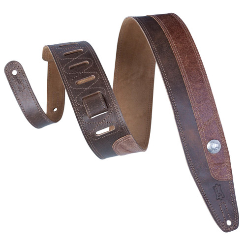 Levy's brown leather guitar strap with suede backing, multiple adjustment slots, square buckle, and embossed logo near the end. Levy's brown leather guitar strap with suede backing, multiple adjustment slots, square buckle, and embossed logo near the end.