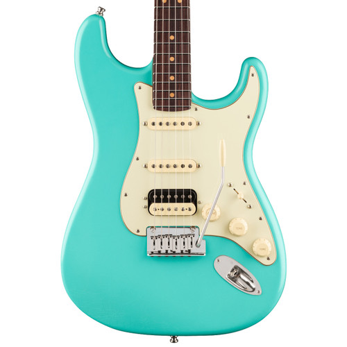 Fender American Ultra Luxe Vintage Series HSS Stratocaster electric guitar with a sea foam green body, white pickguard, two single-coil pickups, one humbucking pickup, three control knobs, and a tremolo bridge.