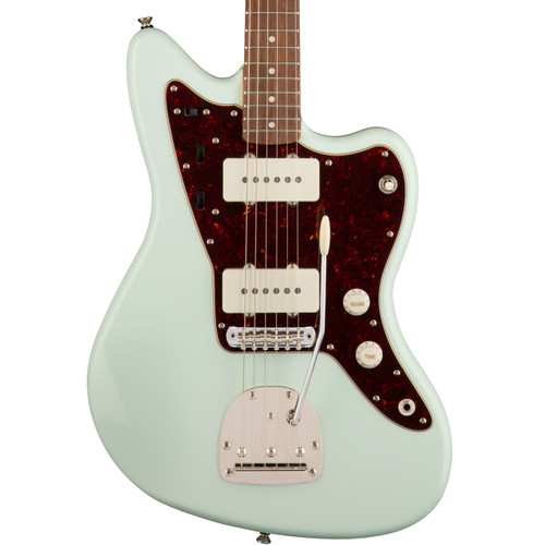 Light blue electric guitar with tortoiseshell pickguard, two white single-coil pickups, tremolo arm, and Indian Laurel fretboard with dot inlays