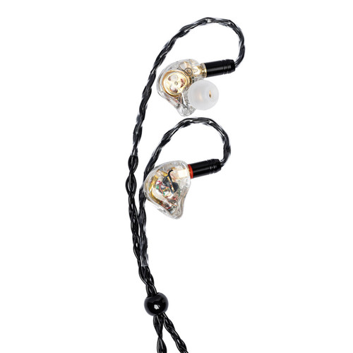 Stagg SPM-PRO in-ear monitors with transparent earpieces, visible internal components, Stagg logo, and braided black cable.