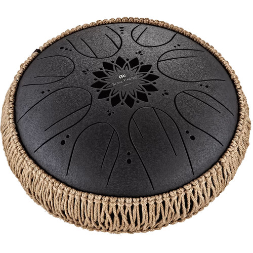 Meinl Sonic Energy Medium Octave Steel Tongue Drum in black finish, featuring a circular shape with decorative lotus-style cutouts and tuned tongue slots on the top surface, surrounded by an intricate woven rope border.