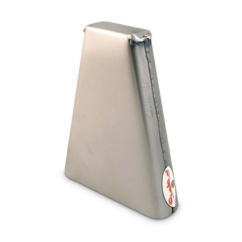 A brushed steel cowbell with a tapered shape, wider at the base and narrower at the top, featuring visible welded seams and a small oval logo sticker near the bottom edge.