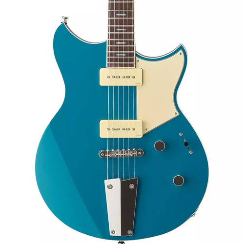 Front body view of a blue Yamaha electric guitar with two cream P‑90 pickups, cream pickguard, and a chrome tailpiece.