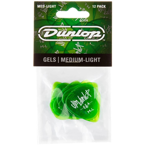 A package of green Dunlop medium-light guitar picks with a clear plastic window showing several picks inside.