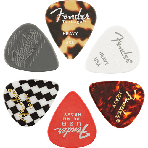 A collection of six Fender guitar picks with various designs and colors arranged neatly.