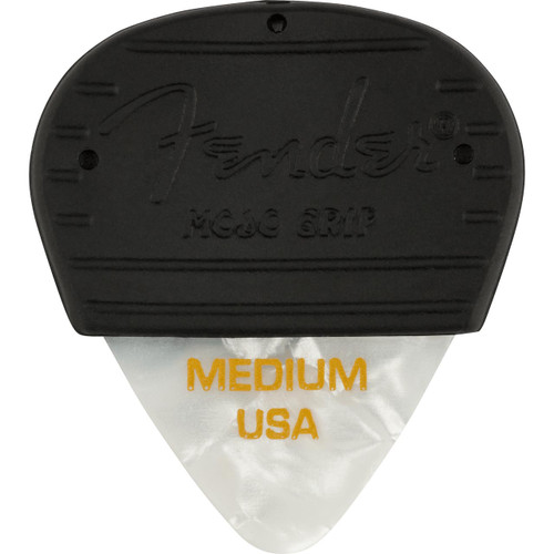 A close-up of a black Fender Mojo Grip guitar pick with "Medium USA" printed on its white tip.