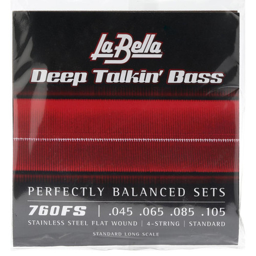 A close-up of LaBella's 760FS Deep Talkin' Bass Guitar Strings packaging with red flatwound strings visible inside against a black background.