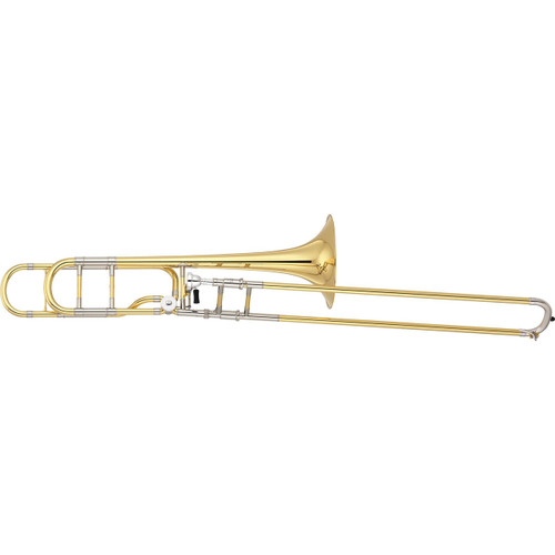 Yamaha YSL-882OR Xeno Series professional tenor trombone with a yellow brass bell, open-wrap F-attachment configuration, high-performance rotary valve with an ergonomic black thumb rest, and clear lacquer finish, in a horizontal side profile.