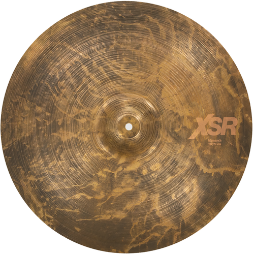 A direct overhead, top-down view of a 20-inch Sabian XSR Monarch cymbal against a white background. The cymbal features a highly textured, unpolished raw finish with a dark brown and golden-brown mottled, marbled pattern. Fine circular lathing lines cover the entire surface, and a muted tan XSR logo with "Monarch 20”/51 cm” is printed on the right side.