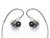 Rear view of Mackie MP-460 in-ear monitors with transparent housings, visible internal components, black ear tips, and gray over-ear cables against a plain background.