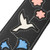 Detail of white hummingbird design on the Levy's Sunbird Series guitar strap.