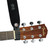 Levy's acoustic guitar headstock strap adaptor attached to a Fender acoustic guitar to demonstrate the way it attaches to the instrument.