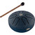 Navy Blue Meinl Pocket Steel Tongue Drum placed next to a wooden mallet with a black rubber tip. The drum has six curved tongue-shaped cutouts and a Venus flower symbol in the center, with the Meinl logo near the edge.
