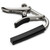 A close-up of a silver Shubb guitar capo with black handle against a white background.
