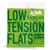 A package of LaBella low tension flatwound electric bass guitar strings with specifications clearly displayed on a green background.