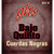A close-up of GHS Bajo Quinto strings packaging with intricate designs and bold text on a dark background.