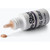A bottle of On-Stage Peg Grip with a small applicator tip and a drop of compound on the surface below it.