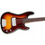 Horizontal close-up of a Fender Precision Bass body, showcasing the sunburst lacquer finish, tortoiseshell pickguard, thumb rest, silver control knobs, and vintage-style chrome covers.