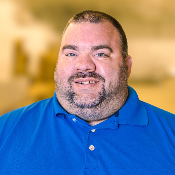 Headshot of Aaron Poff, a Ted Brown Music AVL specialist.