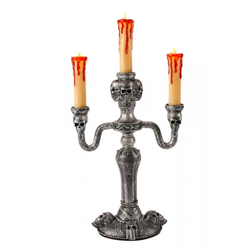 Illuminate your spooky scenes with the 14" LED Haunted Mansion Candelabra. This eerie yet elegant piece features a striking silver finish, beautifully adorned with detailed skull accents for a touch of gothic charm. The candelabra is enhanced with LED lights that emit a ghostly glow, complemented by red dripping candle wax that adds a dramatic, blood-curdling effect. Standing at 14 inches tall, it’s perfect for creating a chilling ambiance for Halloween or any haunted event. This stunning candelabra combines both style and a hint of sinister allure, making it a must-have for your haunted mansion theme or frightful gatherings. Batteries not included.