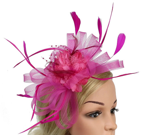 Add a touch of elegance to your outfit with our Pink Fascinator! This charming accessory features a pink headband adorned with delicate ribbons, feathers, and beads, complemented by a beautiful fabric flower. Perfect for special occasions, parties, or simply to elevate your everyday look, this fascinator is a stylish statement piece that will turn heads! Add a touch of elegance to your outfit with our Pink Fascinator! This charming accessory features a pink headband adorned with delicate ribbons, feathers, and beads, complemented by a beautiful fabric flower. Perfect for special occasions, parties, or simply to elevate your everyday look, this fascinator is a stylish statement piece that will turn heads!