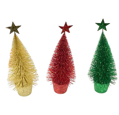Glitter Christmas Tree. Standing 7.5 inches tall, this charming tabletop tree is dusted with a glitter. Available in gold, red, or green, each tree features a glittery star topper and sits on a matching stand. Package includes one tree. Desired color not guaranteed.