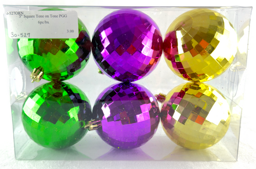 Bring a fun, festive vibe to your Mardi Gras celebration with these 3-inch Disco Ball Ornaments. This set includes two green, two purple, and two gold disco balls, perfect for adding a touch of sparkle and shine to your décor. Whether hung on your tree, placed in a centerpiece, or used as party accents, these eye-catching ornaments reflect the lively spirit of Mardi Gras with a playful twist. Package includes 6 ornaments.