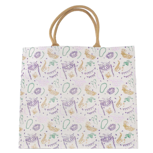 Royal Parade Carryall Tote. Made from jute, this spacious tote features a pattern of masks, pennants, crowns, beads, balloons, saxophones, and confetti in purple, green, and gold. Measures 19in x 22in x 8in.