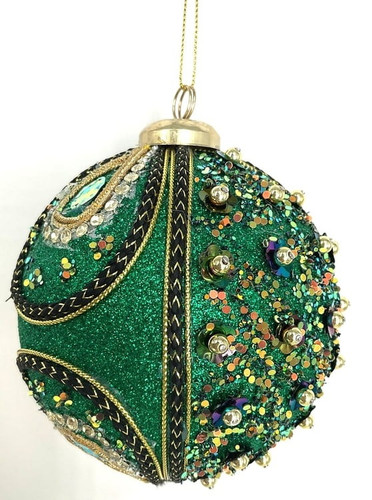 Green Sparkle Ornament. This ornament features a shimmery green base, held by a gold string hanger, enhanced by multicolored glitter and jewel accents. Measures 4in.