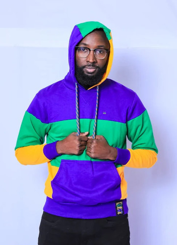 Adult Mardi Gras Wide Panel Hoodie. In purple, green, and gold, this hoodie features a wide panel design, along with matching purple, green, and gold laces. The purple pocket adds extra functionality.