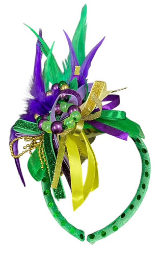 Mardi Gras Bead & Feather Headband. This headband is covered in sparkly green tinsel, topped with a bow shape made of an assortment of feathers, beads, and different types of fabric ribbon in purple green and gold. One size fits most.