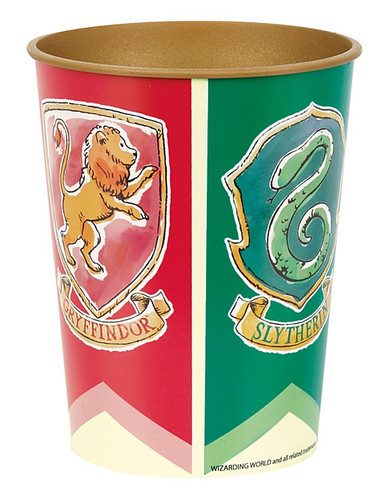 Harry Potter Plastic Favor Cup. This gold cup showcases a wrap-around design of watercolor-like sketches representing the emblems of the Hogwarts houses on flags: Gryffindor, Slytherin, Ravenclaw, and Hufflepuff. Package includes one cup measuring 16oz. Harry Potter Plastic Favor Cup. This gold cup showcases a wrap-around design of watercolor-like sketches representing the emblems of the Hogwarts houses on flags: Gryffindor, Slytherin, Ravenclaw, and Hufflepuff. Package includes one cup measuring 16oz.