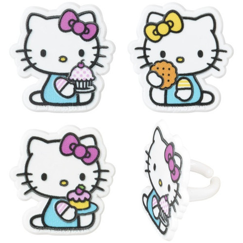 Hello Kitty and Mimmy Cupcake Rings. Each plastic ring showcases either sister, dressed in their classic blue overalls—Hello Kitty with her pink bow and Mimmy with her yellow bow. Both are sitting, holding a tasty treat like a cupcake or cookie. Amount of each color style in a pack will vary. Package includes 6 count rings measuring 1.45in x 1.50in.