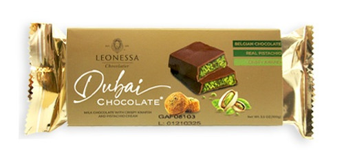 Dubai-inspired Chocolate Bar. Made with smooth, rich Belgian chocolate, this bar includes crunchy pistachio and bits of crispy knafeh. Though not made in Dubai, every bite is inspired by the flavors and textures found in its world-famous sweets. Net WT 3.5oz.