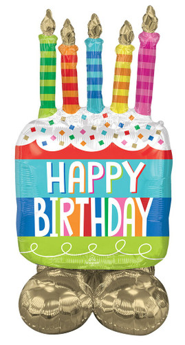 This DIY self-sealing balloon features a cake shape with multicolor candles and sprinkles. White text reading "HAPPY BIRTHDAY" with multicolor shadows, and the base is shiny gold. Measures approximately 49in.