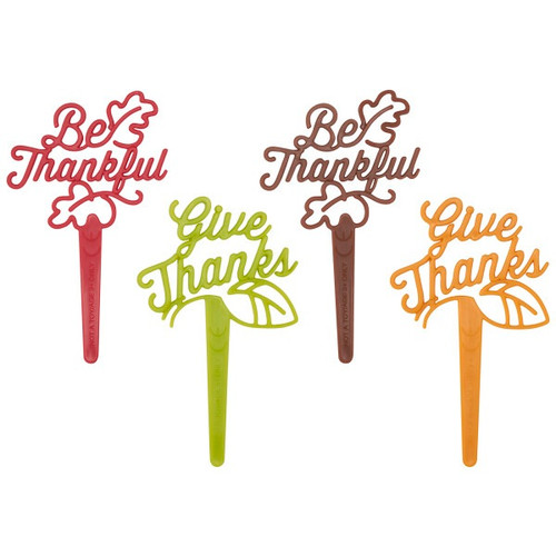 Be Thankful Deco Pics. Each pick features the phrase “Be Thankful” or “Give Thanks” in script, accented with a leaf detail. Available in autumn-inspired shades of brown, red, orange. Package includes 6 count pics, measuring 1.5in x 2.85in. Amount of each color and style will vary.